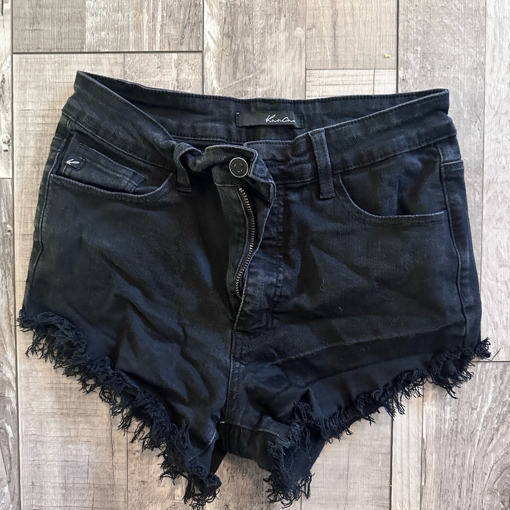 Kansan jean short in color black.  Size 9